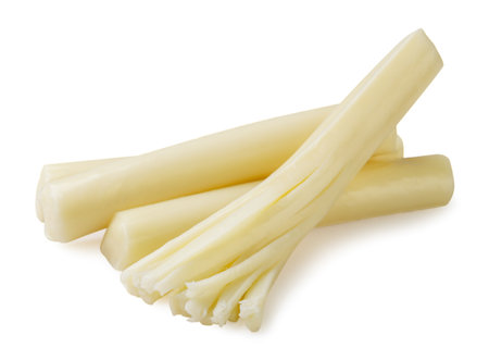 Pile of string cheese sticks close-up on a white background. Isolated