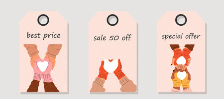 Vector set of discount price tags. Labels with Hands in mittens hold a heart made of snow. Christmas sale.のイラスト素材