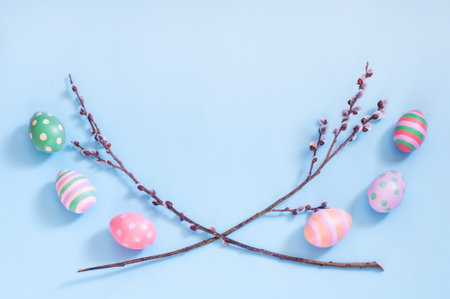Easter eggs and sprigs of willow on a blue background, Easter, springの写真素材