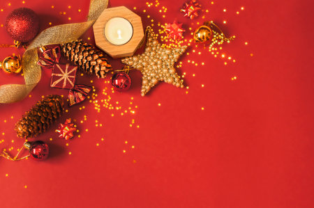 Christmas holidays composition on a red background with copy space for your textの写真素材