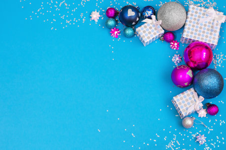 Christmas card, Christmas balls and gift boxes on a blue backgroundの写真素材
