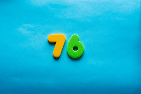 76 years old celebrating classic . Colored happy anniversary 76 th template colorful numbers. Greetings celebrates card. Traditional framed digits of ages. Sale, special prize, % off concept.の写真素材