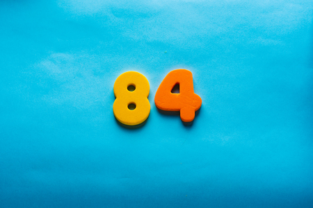 84 years old celebrating classic . Colored happy anniversary eighty-four  template colorful numbers. Greetings celebrates card. Traditional framed digits of ages. Sale, special prize, % off concept.の写真素材