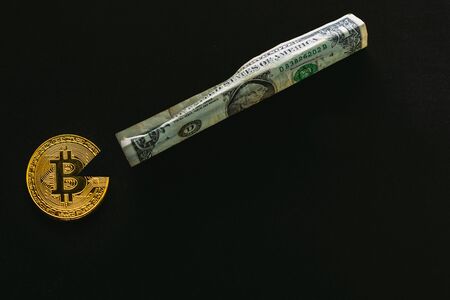 Bitcoin eating dollar. For articles or publications : Bitcoin vs USD dollar, Is Strong,Stable and Better Than Gold and other currencies.Copy space for text.の写真素材