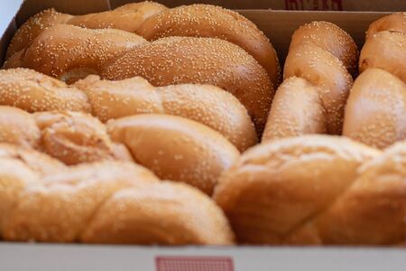 Breads and baked goods close-up. Fresh challah bread for shabbat. Bakery bread bun background.