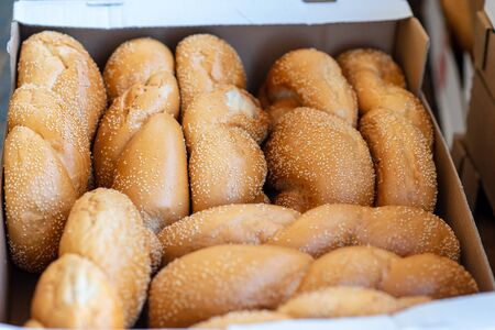 Breads and baked goods close-up. Fresh challah bread for shabbat. Bakery bread bun background.