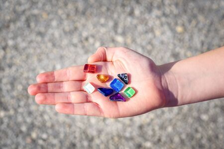 Rockhounding showing a colorful stones on day light. Image from gem mining vacations with children.