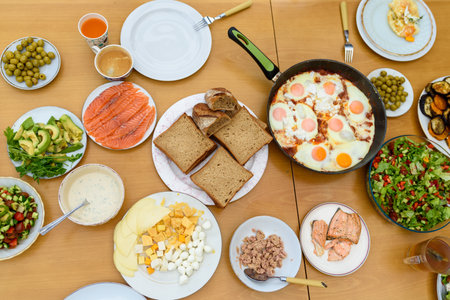 Table with a colorful fresh homemade meal.