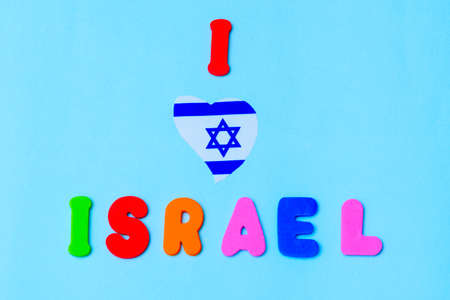 Text - I Love Israel with flag Israel Magen David Star heat shape on blue background.の写真素材