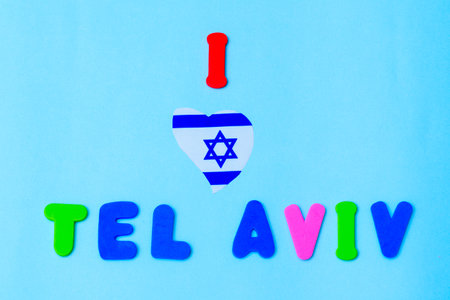 Text - I Love Tel Aviv with flag Israel Magen David Star heat shape on blue background.
