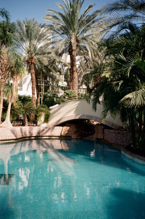 Royal Garden Hotel in Eilat, Israel - May 2023. Crystal clear waters of a serene swimming pool,...