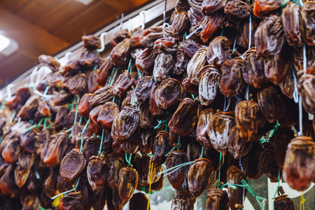 Dried persimmon fruits are sold at the market. dried fruitsの写真素材