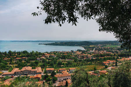 Amazing view of Lake Garda from Padenge sul Garda, Italy. Beautiful sunny day.の写真素材