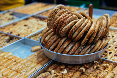 Traditional arabic sweets and bakery (dessert kadaif, kunafa, baklava, simits) in the Jerusalem...
