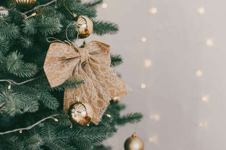 Beautiful fir-tree with christmas golden ornaments. Holiday concept. Selective focusの写真素材