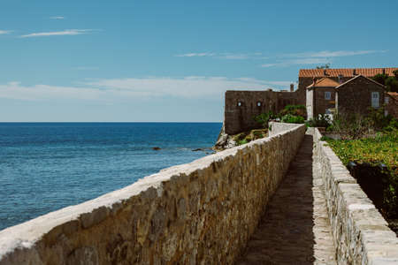 Amazing view of Budva old town and the sea. beautiful cloudy sky. Travel destination in Montenegro.の写真素材