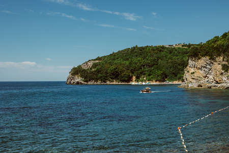 Amazing view of the Adriatic sea near Budva. Beautiful cloudy sky. Travel destination in Montenegro.の写真素材