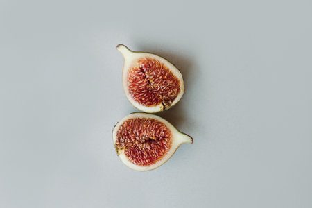 Ripe figs on a gray background. minimal concept. Place for text. flat lay.の写真素材
