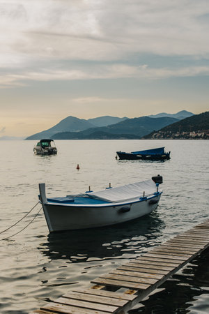 Beautiful boat in the sea near Dubrovnik city on a sunset. Travel destination in Croatia.の写真素材