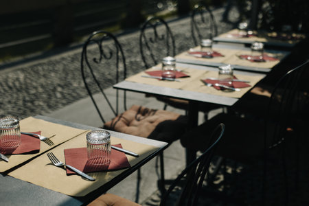 Empty cafe on a street in Milan, Italy. Travel destination in Italy.