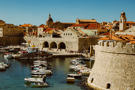 Amazing view of Dubrovnik old city and the boats in a marina on a sunny day. Travel destination in Croatia.の写真素材