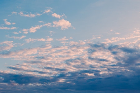 Amazing sunset sky with beautiful colorful dramatic clouds. Place for text.の写真素材