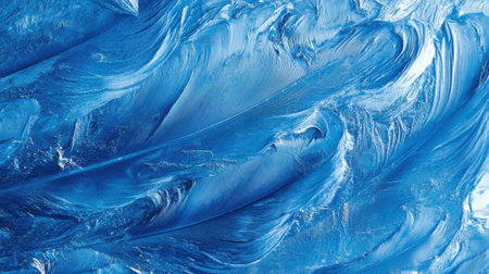 Close up feather in blue color. Abstract textured background. Monochrome in blue colors.の素材