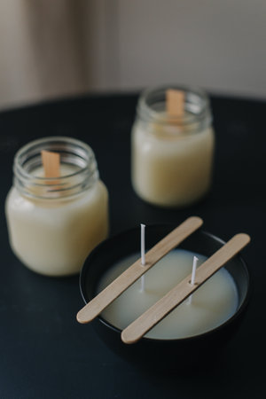 Process of a hand made candles manufacturing, preparation of candle wicks. Selective focus. Close up.の写真素材