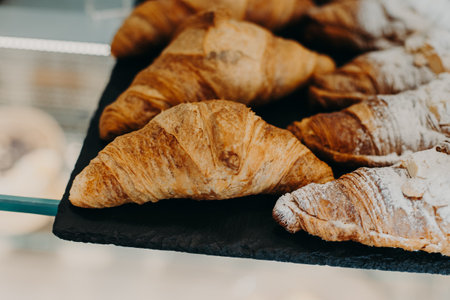 Freshly baked croissants in a traditional bakery. Close up. Selective focus.の写真素材