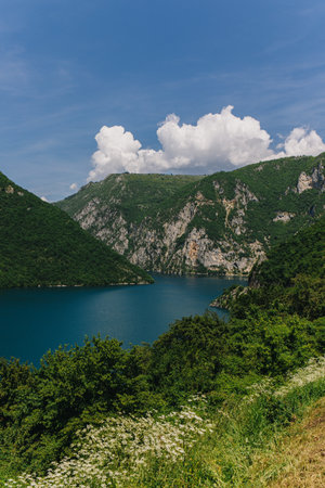 Amazing view of Piva Lake and mountains on a summer day. Travel destination in Montenegro.の写真素材