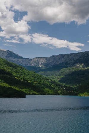 Amazing view of Piva Lake in a beautiful canyon and mountains on a summer day. Travel destination in Montenegro.の写真素材