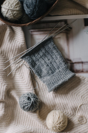 Hand knitting with needles and yarn balls. Concept for handmade and hygge slow life.の写真素材