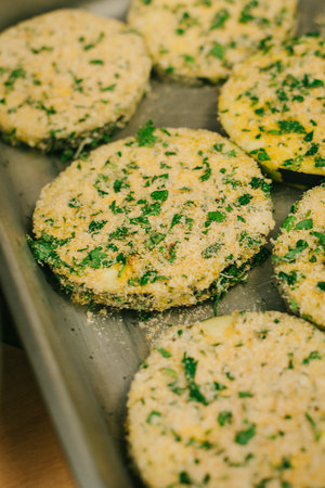 Slices of eggplants for frying with herbs. Close-up.の写真素材