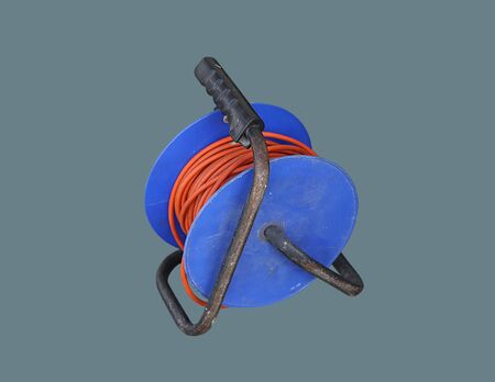 Construction worker reel of electric cable on an isolatedの写真素材