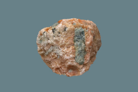 Pink calcite stone with apatite on an isolated background.の写真素材