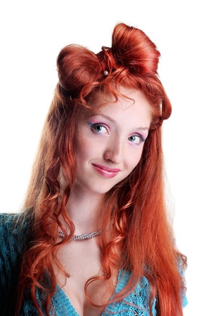 beautiful young woman with a fashionable hairstyle isolated on whiteの写真素材