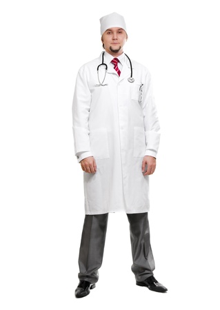 Male doctor standing against white backgroundの写真素材