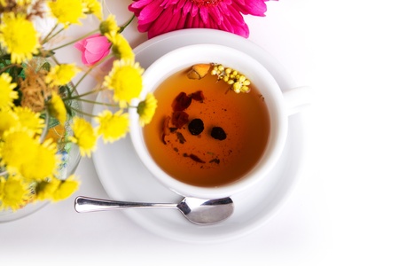 cup of herbal tea with beauty flowersの写真素材