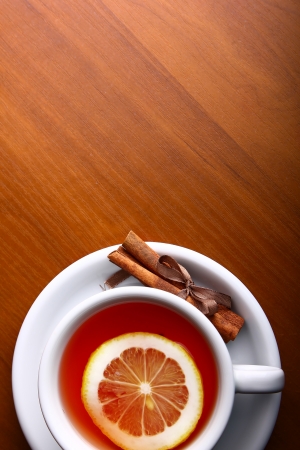 Cup of Hot Tea with Lemon on a wooden tableの写真素材