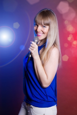 pretty girl singing at the revelry partyの写真素材