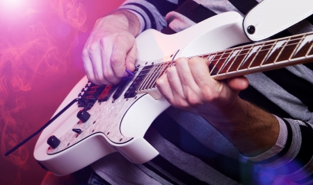 rockstar playing solo on guitarの写真素材