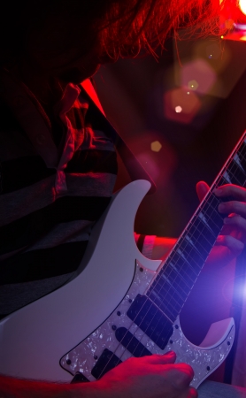 rockstar playing solo on guitarの写真素材