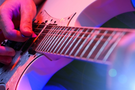 rockstar playing solo on guitarの写真素材