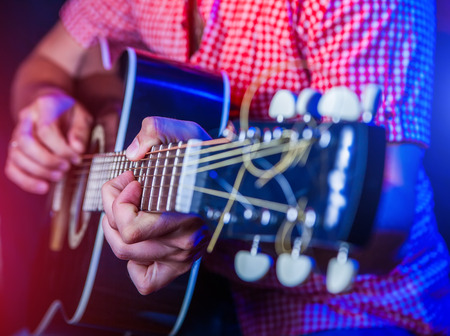 rockstar playing solo on guitarの写真素材