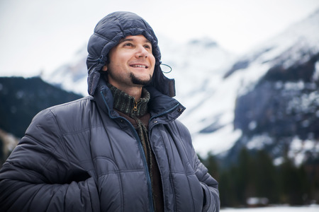 man on the background of the Alps