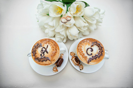 Wedding two cups of cappuccino with lettersの写真素材