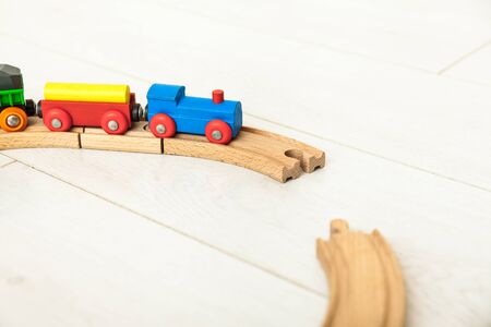 Childd wooden train on the white floorの写真素材