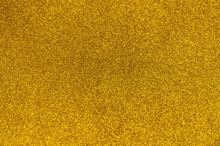 Shiny abstract Golden glitter decorative texture backgroundの写真素材