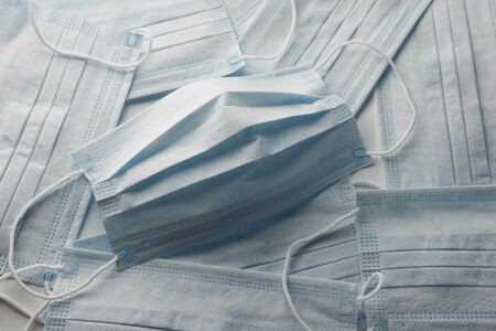 coronavirus pandemic. Medical mask for protection against flu and other diseases. Background of Surgical mask. COVID middle East respiratory syndrome coronavirus. corona virus disease 2019, COVID-19.の写真素材