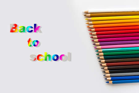 Back to school. Colorful pencil crayons on a white backgroundの写真素材